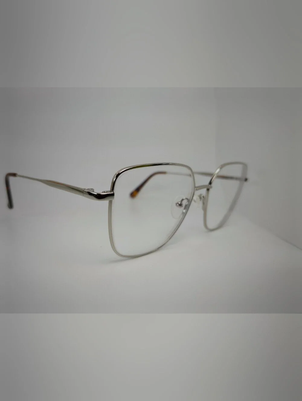 Bessie. Titiaium. Women's Oversized Square Metal Frame Glasses in Chrome.